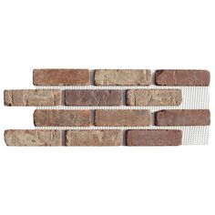 a brick wall with different colors and sizes