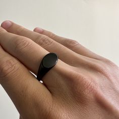 Feel more confident about the ring you wear every day, with purpose and meaning behind it. Our signet ring will be the perfect accessory for any outfit. ● Materials: - (316L) Stainless steel vacuum-plated black.  ● Sizing: - Surface width 9mm ● Durability: - All Livin Well Jewelry is tough, durable, and rust-proof. It won't discolor or turn your skin green. It's waterproof, perfect for showers, pools, and water activities. You can even wear it while working out or in hot and sweaty conditions. ● Warranty:  - Still not sure if this piece is for you? Don't worry, all of our jewelry comes with a lifetime warranty. If for any reason you are not satisfied with the quality or it breaks, you can request a refund. ● Links: - Additional Rings → https://www.etsy.com/shop/LivinWellJewelry?ref=shop-he Black Signet Ring, Signet Ring For Men, Rings Minimalist, Feel More Confident, Mens Rings, Ring Mens, Men Ring, Ring For Men, Water Activities