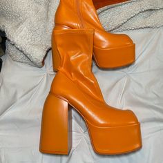 Orange Ankle Boots Never Worn Size 5 Orange Gogo Boots, Cute Orange Shoes, Platform Ankle-high Heeled Boots In Polyurethane, Polyurethane Platform Ankle-high Heeled Boots, Chunky Platform Boots With Pointed Toe In Synthetic, Retro High Heel Boots For Spring, Synthetic Platform Boots With Chunky Platform And Pointed Toe, Trendy High Ankle Heels With Reinforced Heel, Casual Platform Heeled Boots With Block Heel