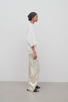 Encore Pant White in Viscose – The Row The Row Outfits Summer, The Row Styling, The Row Fall 2024, The Row Inspired Outfits, White Silk Pants Outfit, Silk Tapered Leg Bottoms With Pressed Crease, White Silk Wide-leg Pants, Satin Tapered Leg Workwear Pants, Satin Tapered Leg Work Pants