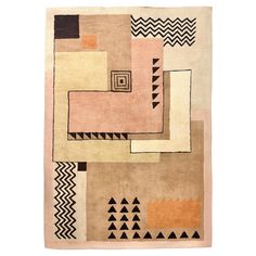 an area rug with various shapes and colors