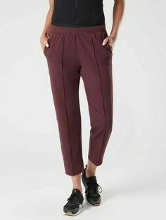 Athleta Venice Pintuck Pant Antique Burgundy  SIZE M     #487666  EXCELLENT USED CONDITION Fit & Sizing Semi-fitted, Mid rise Skims easily over the body Sits below the natural waist Inseam: Regular: 26" Petite: 24" Tall: 29" PRODUCT DETAILS FOR: Commuting, work and travel FEEL: Pilayo® fabric is soft and supple in the hand, stretchy and live-in comfortable on the body FAVE: Easy-access pockets stash your essentials Back zip pocket secures your small essentials #487666 FABRIC + CARE Nylon/Lycra W Maroon Pants, Slacks Trousers, Tweed Pattern, Work And Travel, Jumpsuit Trousers, Confident Woman, The Hand, Athleta Pants, Pin Tucks