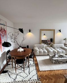 a living room filled with furniture and decor