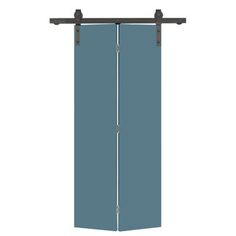 a tall blue door with two metal bars on the bottom and an iron bar at the top