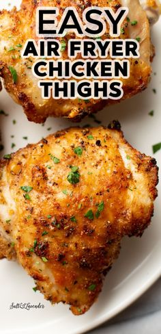 easy air fryer chicken thighs on a white plate with text overlay that says easy air fryer chicken thighs