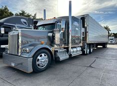 a large semi truck parked in a parking lot