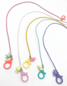 🦄 Lanyard with Candy Charm 🦄 🦄 Leatherette Braided Lanyard - Light Weight 🦄 Finish with plastic lobster clasps : safe and easy to use 🦄 Candy charm included 🦄 Available Color options : - Yellow - Coral - Pink - Purple - Mint 🦄 NECKLACE ONLY 🦄 Ship in 1 Business Day 🦄 A return may not be accepted due to safety matter. HAND MADE WITH LOVE with fast shipping! Mint Necklace, Pastel Candy, Mask Lanyard, Back To School Kids, Mask Holder, Kids Mask, School Kids, Badge Holders Lanyard, Mask For Kids