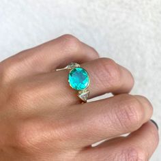 Item Details: 2.43 ct. natural Colombian Emerald vibrant light green color. Six round brilliant-cut diamonds weighing 0.06 ct (F/VS) Two trillion-shaped diamonds weighing 0.82 ct. (E/VS) Set in 18K yellow gold This ring is made with a one-of-a-kind center stone. To create a similar ring email custom@berlingerrings.com. Enquire about this ring Design a custom piece with us Trillion Diamond Ring, Trillion Diamonds, Columbian Emeralds, Ring Inspo, Colombian Emeralds, Tourmaline Necklace, Band Engagement Ring, Emerald Jewelry, Dream Jewelry