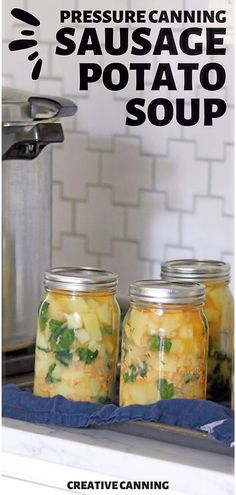 three jars filled with food sitting on top of a counter next to a pot and pan