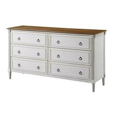 a white dresser with wooden top and drawers on the bottom, in front of a white background