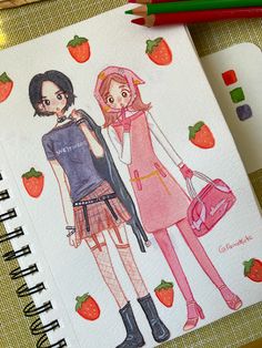 two girls are standing next to each other with strawberries on the table behind them