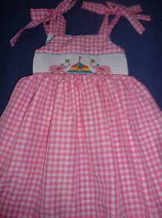 Hand smocked summer dress with pink elephants and circus. Ties at the shoulders and back. This could be a birthday dress. For other sizes allow 3 tweeks Perfect Birthday Dress, Rabbit Dress, Hand Smocked Dress, Birthday Summer, Circus Birthday, American Doll Clothes, Hand Smock, Toddler Birthday, Girl Toddler