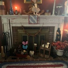 a living room filled with furniture and a fire place covered in stuffed animal figurines