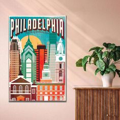 philadelphia, pennsylvania travel poster on the wall in a living room with a potted plant