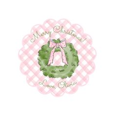 a pink and white checkered christmas card with a wreath