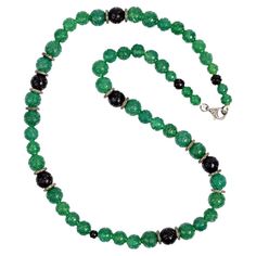 Made with a combination of green and black onyx beads, this handcrafted necklace is accented with glittering diamonds for a touch of elegance . Upgrade your jewelry collection today with this one-of-a-kind piece. Diamond:2.52ct, Silver:14.51gm ONYX GREEN:390.1Cts, ONYX BLACK:78.25Cts Size: 650mmXXMM" Native Style, Onyx Bead, Handcrafted Necklace, Jade Jewelry, Jewelry Women, Green Onyx, Green And Black, Necklace Handmade, Silver Diamonds