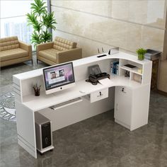 an office desk with a computer on it