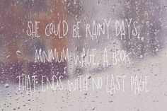 the words are written in white on a rainy window