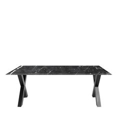 a black marble table with metal legs