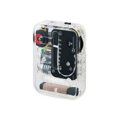 an electronic device in a clear case with wires and other items inside it on a white background