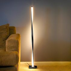 The elegant and unique style of the modern Helix LED Floor Lamp is sure to impress any that beholds its beauty. The gently twisting fixture stays true to that modern elegance, making it a beautiful addition to your bedroom, office, or study! Brightech 48-in Classic Black Stick Floor Lamp | HLX-BLCK Pole Lamp, Pole Lamps, Stylish Floor Lamp, Industrial Floor Lamps, Tall Lamps, Lamp Cord, Torchiere Floor Lamp, Led Floor, Modern Floor