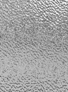 rain drops on the window glass in black and white