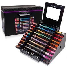 an open makeup box with many different colored eyeshades