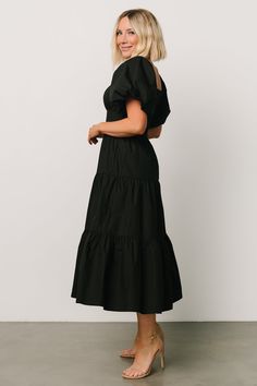 FINAL SALE Baltic Born exclusive style Bold black color Cotton material Comfortable relaxed fit Smocked back for a comfortable fit Darling square neckline Classic short puff sleeves with elastic cuffs Functional side pockets Tiered midi skirt Fully lined Self: 100% Cotton Lining: 100% Polyester Marianne is 5'6, cup size 34D, size 6 and wearing size S Chic Black Puff Sleeve Dress With Smocked Back, Black Puff Sleeve Dress With Smocked Back, Black Puff Sleeve Dress With Gathered Sleeves For Brunch, Black Puff Sleeve Dress With Elastic Sleeves, Black Casual Puff Sleeve Dress With Gathered Sleeves, Casual Black Puff Sleeve Dress With Gathered Sleeves, Black Ruched Puff Sleeve Dress With Square Neck, Casual Black Puff Sleeve Dress For Brunch, Black Square Neck Puff Sleeve Dress For Brunch