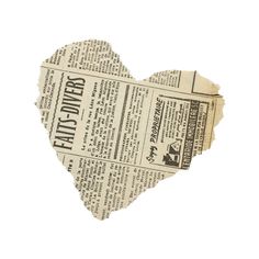 an old newspaper heart cut out into the shape of a paper