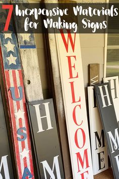 several wooden signs with the words welcome, welcome and welcome