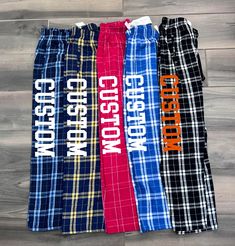 Super cute pajama pants!! So comfy <3 These are a really nice flannel high quality material.  Pants come in so many different colors, so we will match the pant color to your logo colors as best as possible. If you want a specific color please message us! Will be personalized with your school, team, camp, company TEXT or any custom text. Cute college commitment gift or gift for a new roommate or camper! Bed Party, Logo Colors, School Team, College Team, Cute Pajamas, Sleep Shorts, Pajama Robe, Logo Color, Plaid Flannel