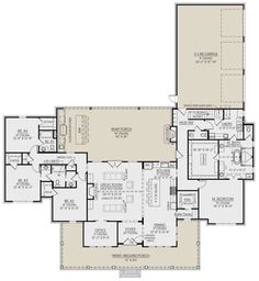 the first floor plan for a home with two master suites and an open concept kitchen