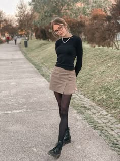 Brown Nylons Outfit, Womens Outfits With Tights, Brown Skirt With Black Tights, Short Skirts With Tights, Gray Plaid Skirt Outfit, Cordory Skirt Outfit, Cute Museum Outfits, It Ends With Us Outfits, Black Nylons Outfit