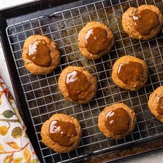 freshly baked pumpkin spiced cookies cooling on a wire rack, ready to go into the oven