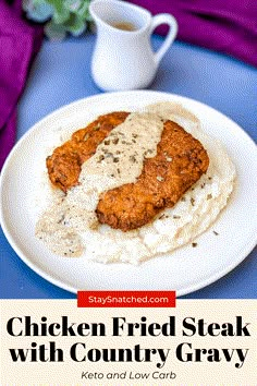 chicken fried steak with country gravy served on mashed potatoes and low carb