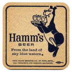 a sign that says hamm's beer from the land of sky blue waters