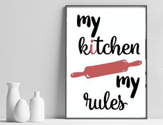 a poster with the words my kitchen rules on it next to three white vases