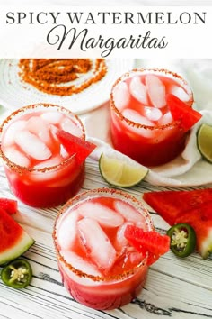 three glasses filled with watermelon margaritas on top of a table