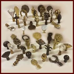 a collection of antique and modern knobs and pulls from the early to mid 20th century