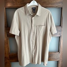 Bought For My Husband And I Don’t Know Why I Didn’t Get His Size Medium So It Is Too Big And Never Fit Him. Collared Beige Camp Shirt With Button Closure, Beige Collared Camp Shirt With Button Closure, Casual Beige Button-up Camp Shirt, Casual Beige Button-up Short Sleeve Shirt, Khaki Casual Top For Business Casual, H&m Summer Shirt For Everyday Wear, H&m Relaxed Fit Shirt With Button Closure, H&m Relaxed Fit Shirt With Buttons, H&m Collared Shirt With Button Closure