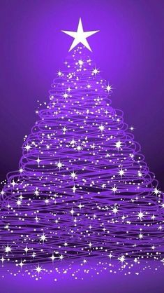 a purple christmas tree with white stars on it