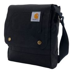 Conquer the day with the Carhartt Legacy Snap Crossbody Bag, the bag that's built strong like you. From work to home and everywhere in between, this bag keeps your hands free to tackle anything that comes your way. It has a large main compartment and a 15 in. laptop sleeve for convenient storage. The bag's water-repellent finish and Carhartt logo complete the design. Perfect companion when extra essentials are needed with you on the go, quick access with easy-access flap Ultra tough 600-denier p Snap Bag, Carhartt Logo, Work Bags, Carry All Bag, Everyday Items, Everyday Bag, Black Cross Body Bag, Good Brands, Work Boots