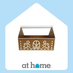 a brown box with a white handle on it and the words at home above it