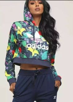 100% AUTHENTIC BRAND NEW!!! Adidas Original Women Cropped Blossom of Life Graphic Hoodie Size Small ED6592 DESCRIPTION Don't be fooled, florals can be groundbreaking. Theadidas Originals Blossom of Life Floral Cropped Hoodie Sweatshirt is a long sleeved, soft knit, athletic inspired hoodie complete with a cropped hem, drawstring neckline, attached hood and the brand's signature trefoil logo resting upon a multicolored, floral patterned base. Rock with a matching pair of leggings and chunky sneak Athleisure Street Style, Drop Shoulder Hoodie, Adidas Tracksuit, Nike Fleece, Adidas Original, Adidas Originals Women, Oversized Crewneck, Crop Hoodie, Sportswear Women