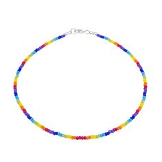 "Colorful rainbow seed bead glass necklace featuring multicolor glass seed beads. Dainty and lightweight, this rainbow seed bead choker features tiny glass beads in colors of the rainbow and can be secured with a sturdy lead and nickel free brass lobster clasp. The length of this beaded rainbow necklace is just right without being too tight or too loose, making it comfortable for all day wear. Measurements(approx, see 3rd photo) Necklace Length(from clasp to clasp):14.5\" Beads:3 mm" Rainbow Beaded Necklace, Beaded Rainbow, Rainbow Accessories, Multicolor Necklace, Seed Bead Choker, Colorful Necklace, Necklace Colorful, Bead Choker, Rainbow Necklace