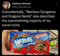 someone is holding up a box of nerds in front of their face and the caption reads, accidentally rainbow unicorns and dragon nerds also describes the overwhing majority of my social circle