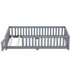 a bed frame with wooden slats on the top and bottom sides, in grey