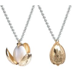 two gold and silver necklaces with an egg