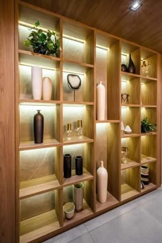 the shelves are filled with vases and other decorative items