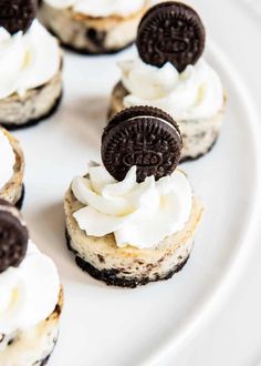 oreo cookies and cream cheesecakes on a white plate